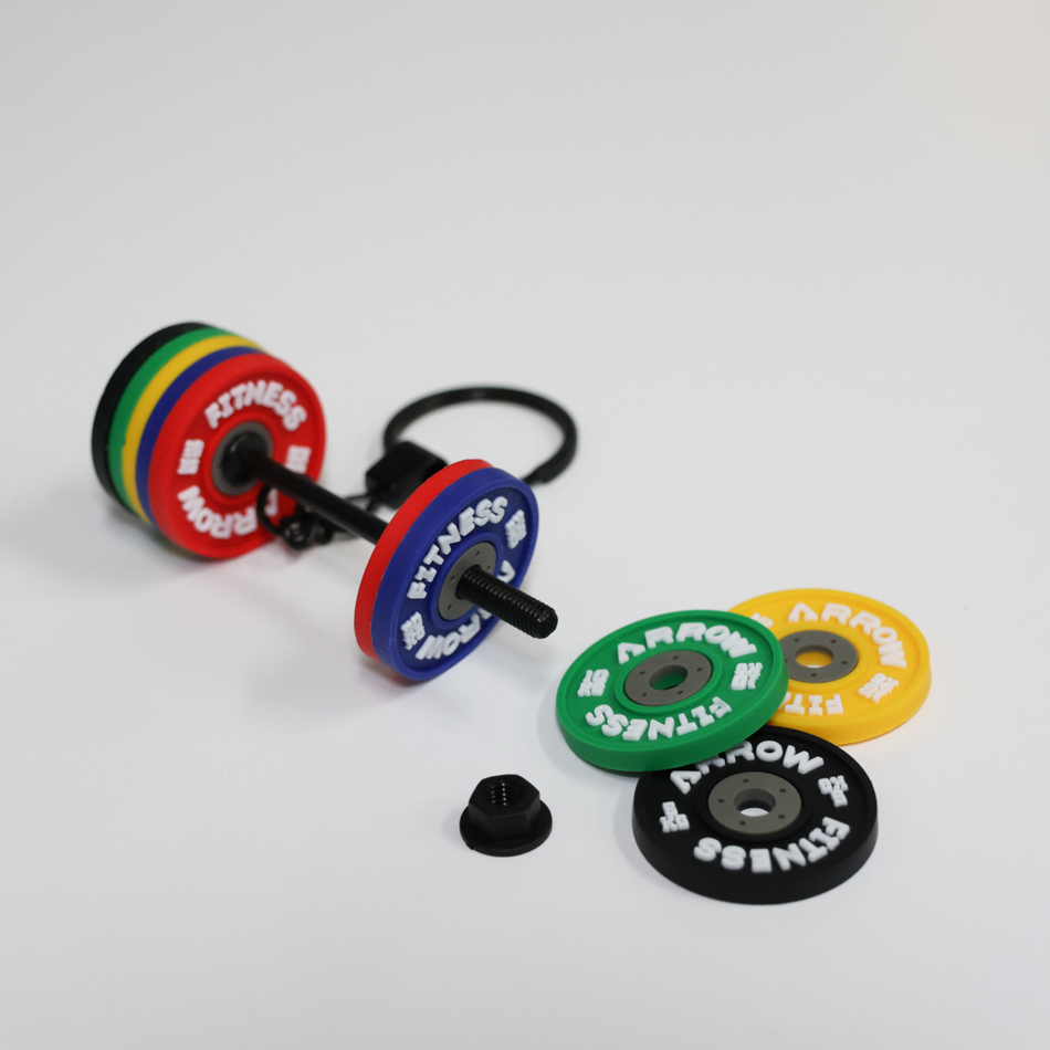 Colorful fitness weight plates on a white background