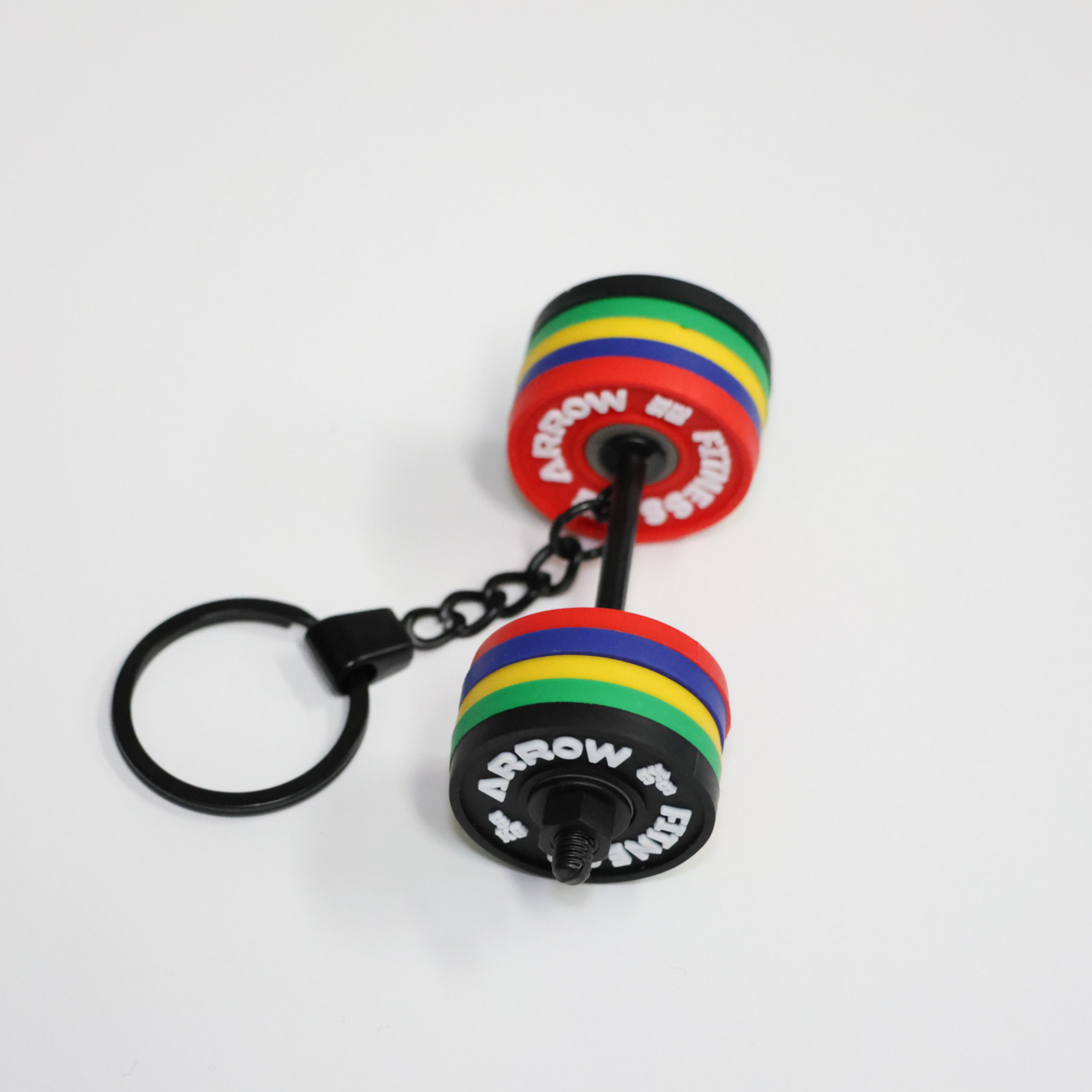 Colorful dumbbell-shaped keychain with rainbow design on a white background